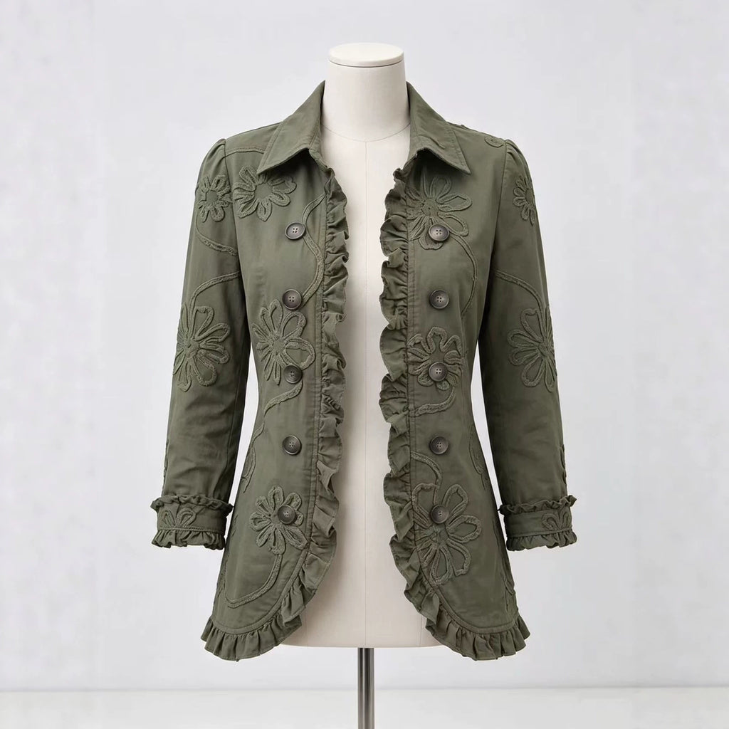 Olive jacket on a mannequin showing floral detailing and decorative buttons