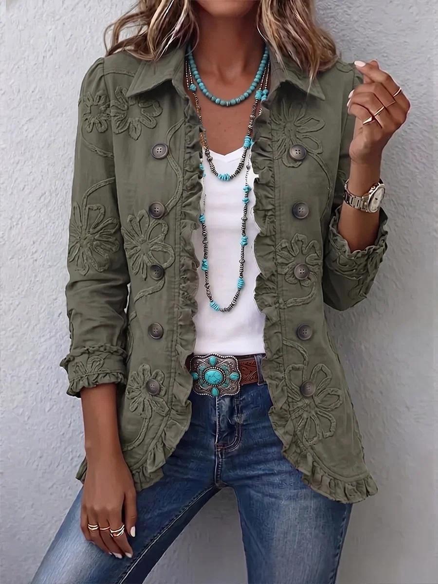 Olive floral-detail jacket worn over a white top with jeans