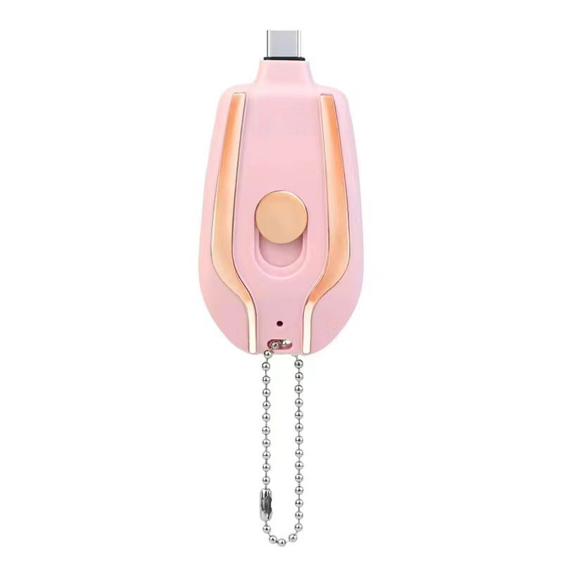 Pink miniature power bank with rose-gold trim and bead-chain keyring