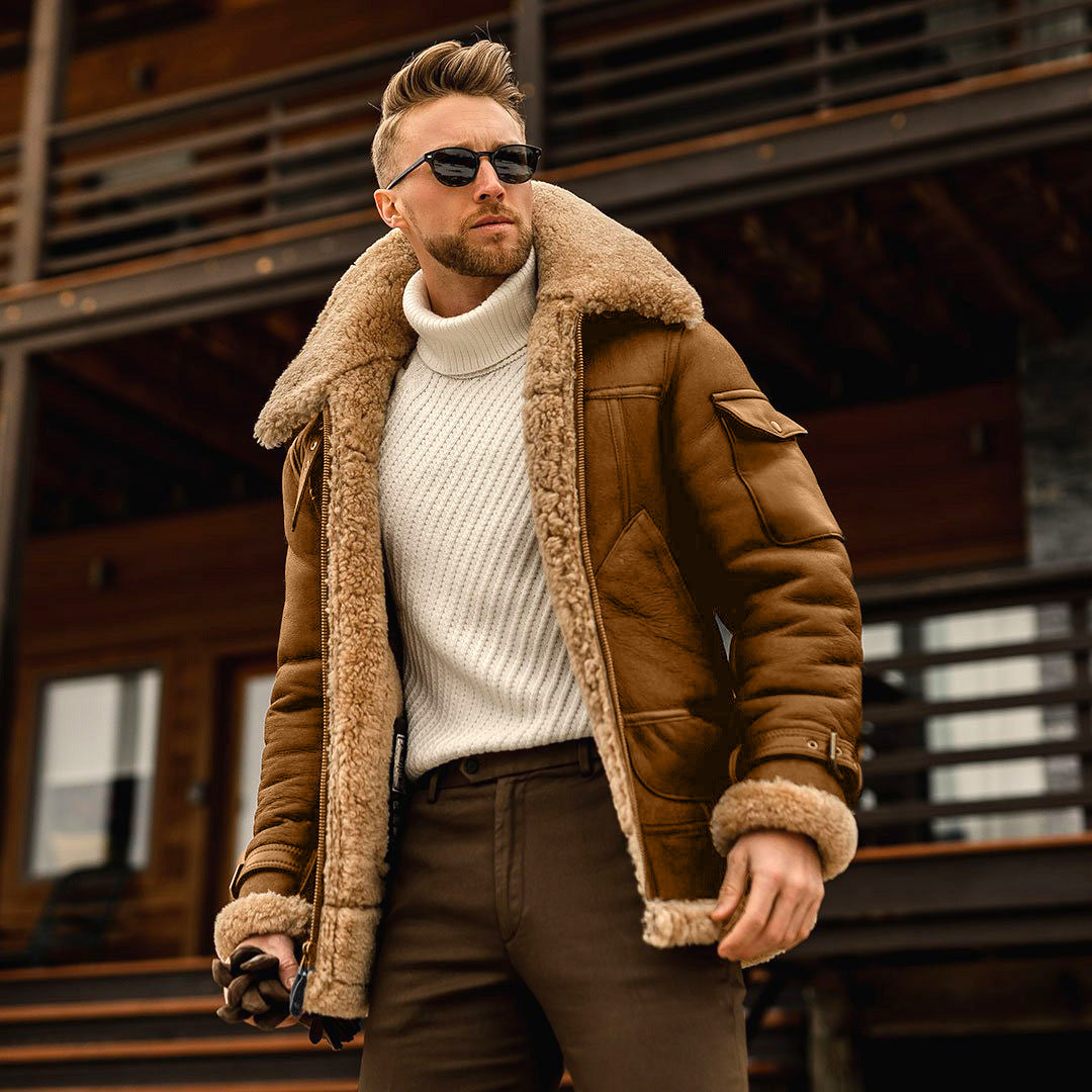 Golden-brown jacket with tan fleece-style collar and cuffs worn over a cream sweater