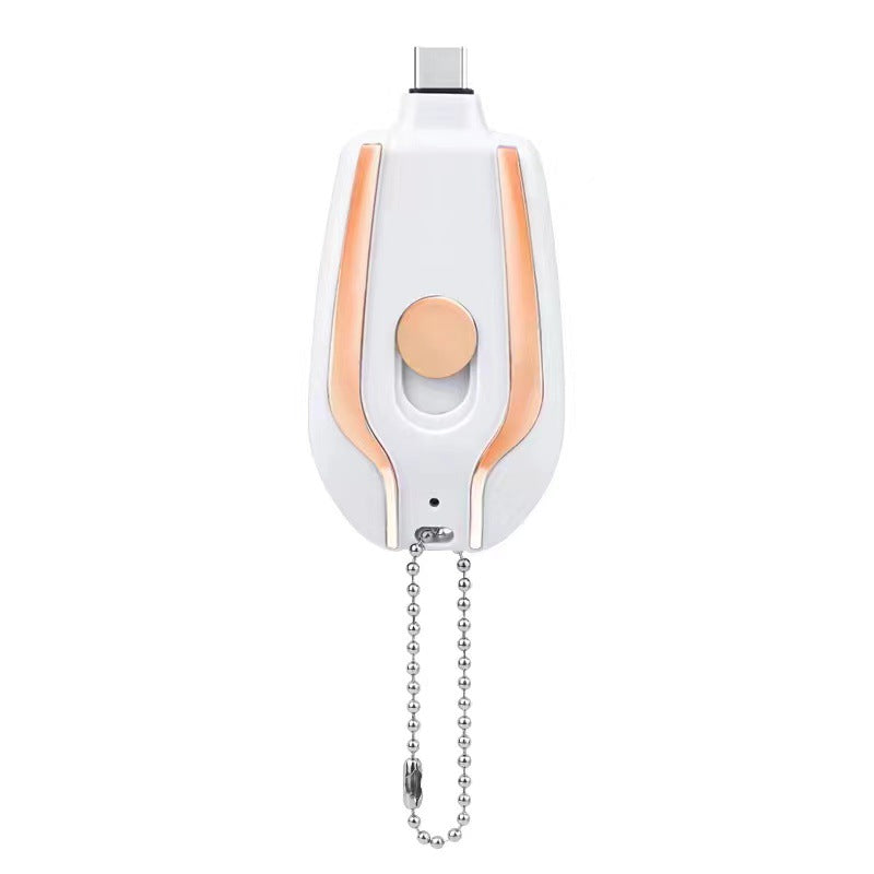 White miniature power bank with rose-gold trim and bead-chain keyring