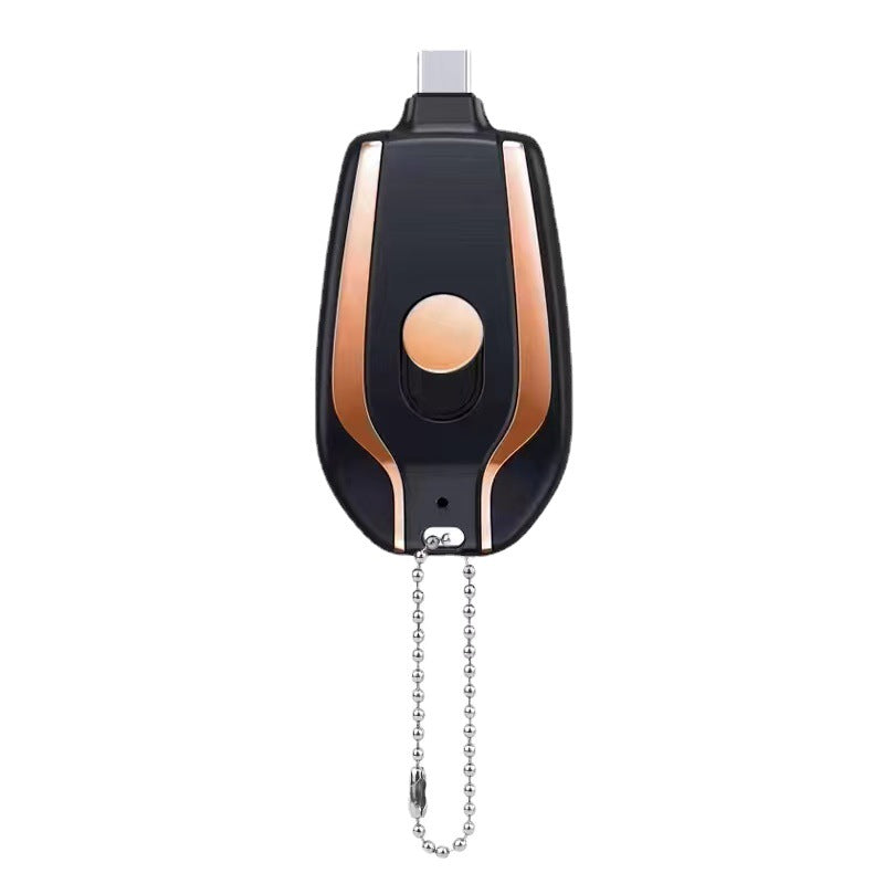 Black miniature power bank with rose-gold trim and bead-chain keyring
