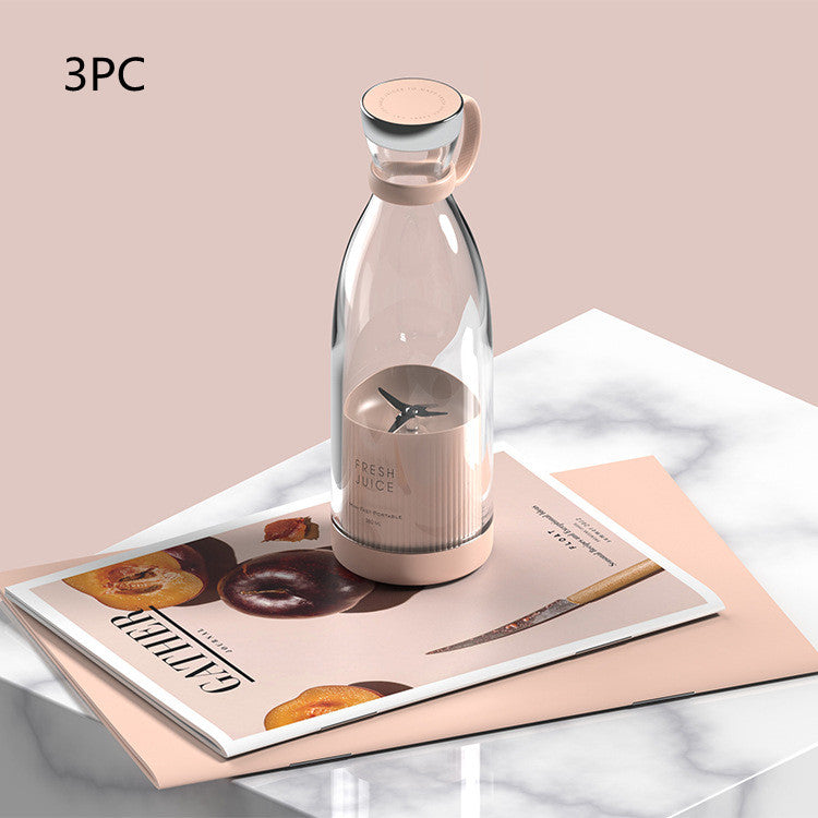 Pink portable blender on a magazine with a 3PC label
