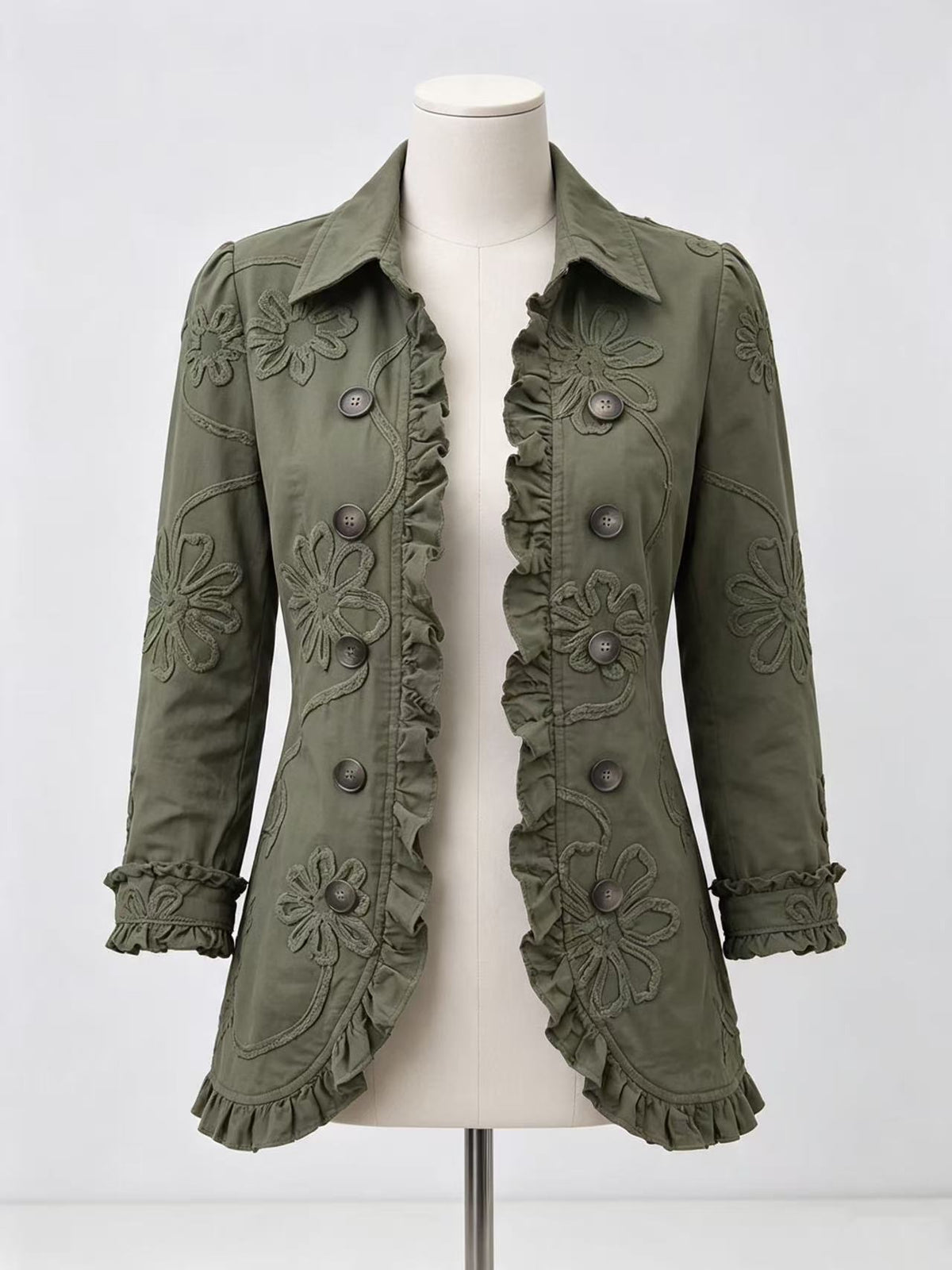 Olive floral-detail jacket on a mannequin with ruffled hem and cuffs