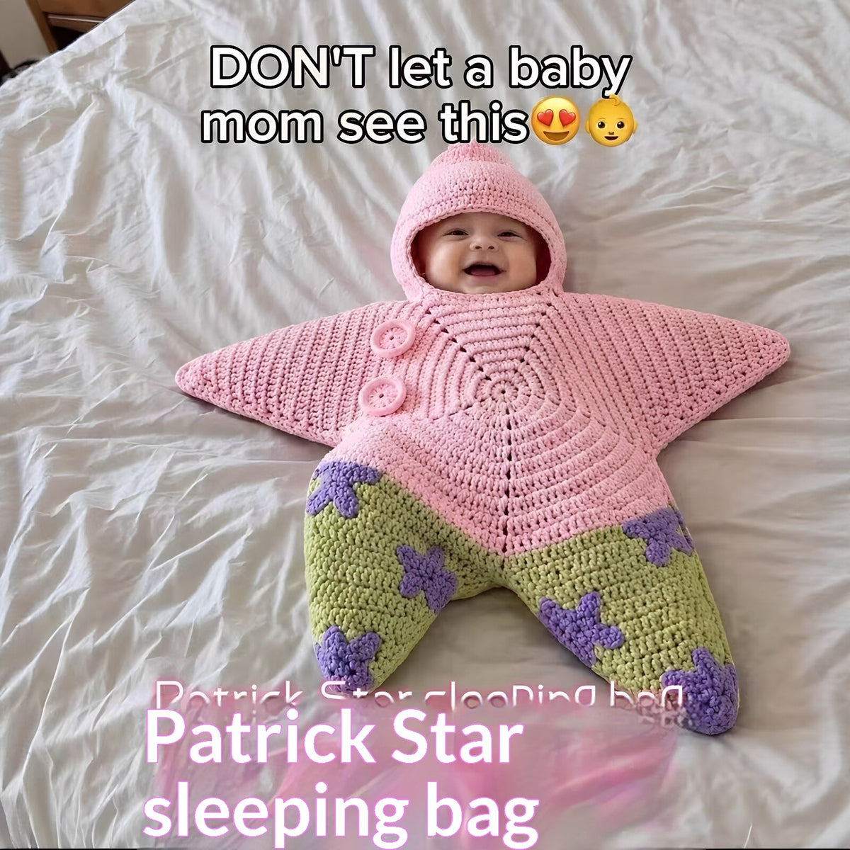Pink and green star-shaped crochet outfit with purple details pictured on a baby